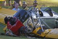 An airplane sits on the ground after crash landing at Penmar Golf Course in Venice, Los Angeles California March 5, 2015. "Star Wars" star Harrison Ford was seriously injured on Thursday when the actor crashed his vintage plane on a Los Angeles golf course shortly after taking off from a local airport, a source told Reuters. (REUTERS/Lucy Nicholson)