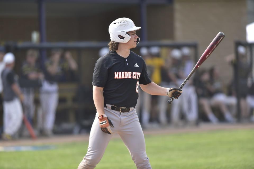 Marine City's Jeffery Heaslip steps in the batter's box during the Mariners' 8-3 win over Macomb Lutheran North in a Division 2 district final at Richmond High School on Saturday, June 3, 2023.