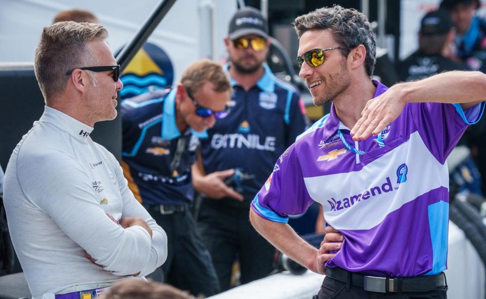 Ed Carpenter Racing driver Ed Carpenter (33) talks with a crew member Thursday, May 19, 2022, before practice in preparation for the 106th running of the Indianapolis 500 at Indianapolis Motor Speedway.