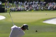 Bryson DeChambeau hits his tee shot on the fourth hole during third round at the Masters golf tournament at Augusta National Golf Club Saturday, April 13, 2024, in Augusta, Ga. (AP Photo/David J. Phillip)