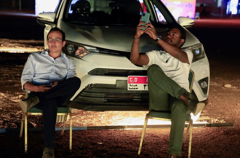 Sudanese watch films from their cars during festival