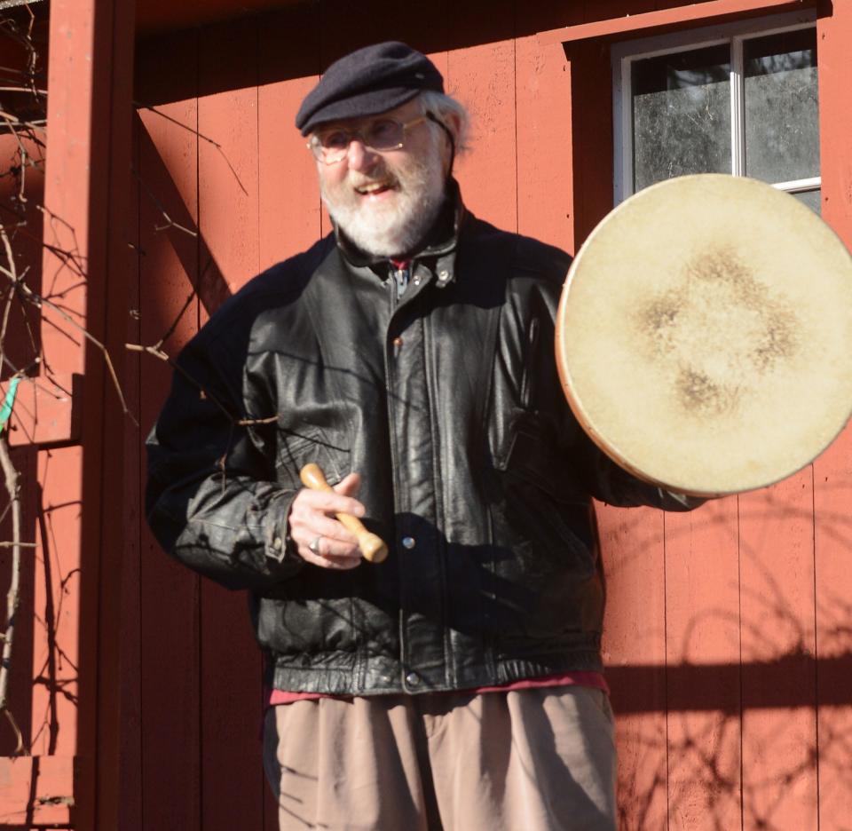 Tom Callinan, the first state troubadour, with a bodhran Irish frame drum at his Norwichtown home.