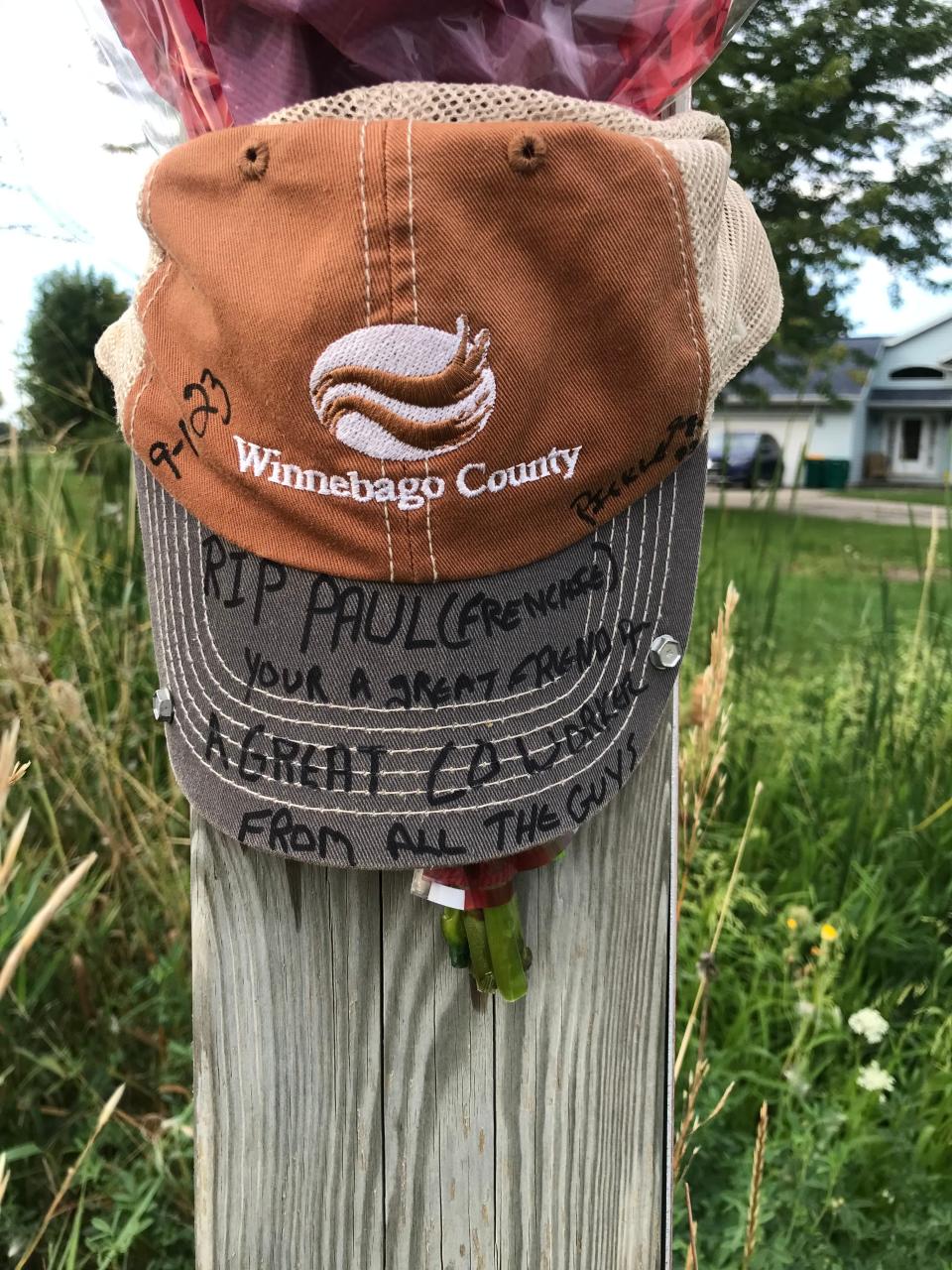 Co-workers of Winnebago County Highway Foreman Paul Delap have erected a memorial with a county hat after Paul and his wife Pam Delap were killed in a motorcycle crash in Fond du Lac County on Sept. 1, 2023.