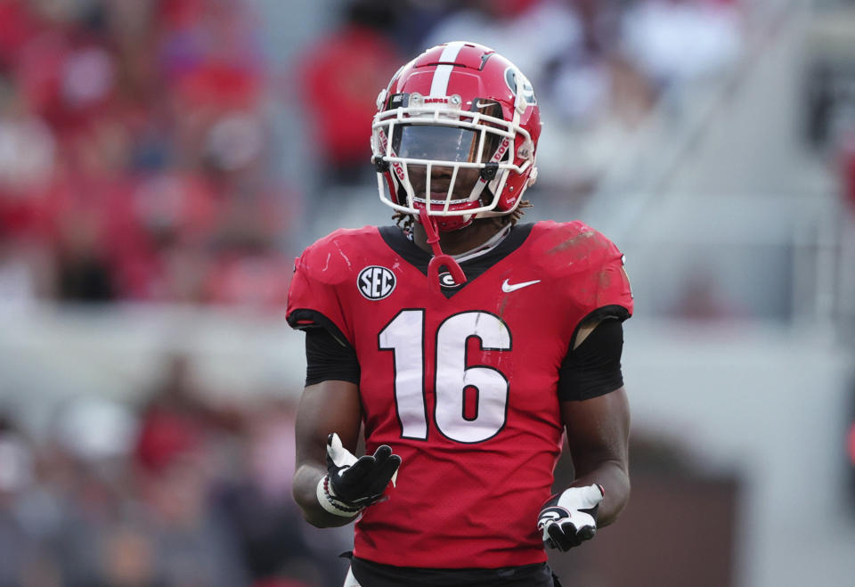 FILE - Georgia defensive back Lewis Cine pauses during the second half of the team's NCAA college football game against Kentucky on Oct. 16, 2021 in Athens, Ga. Cine was selected by the Minnesota Vikings with the final pick in the first round of the NFL draft Thursday, April 28. (AP Photo/Butch Dill, File)