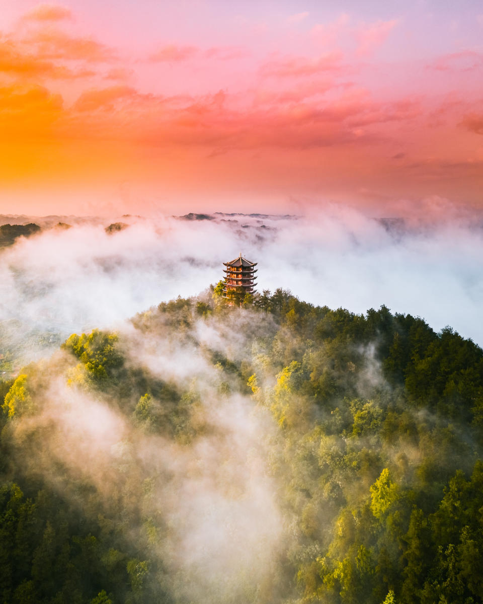 'Best seats in the house, like in the middle of storm' by @panvelvet spectacular sunset over Fenghuang one of Chainaâs most famous old towns.