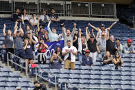 Fans cheer for Minnesota Twins' Louie Varland during the first inning of the first baseball game of a doubleheader against the New York Yankees on Wednesday, Sept. 7, 2022, in New York. (AP Photo/Adam Hunger)