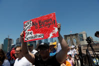 <p>Demonstrators cross the Brooklyn Bridge during “Keep Families Together” march to protest Trump administration’s immigration policy in New York, June 30, 2018. (Photo: Shannon Stapleton/Reuters) </p>