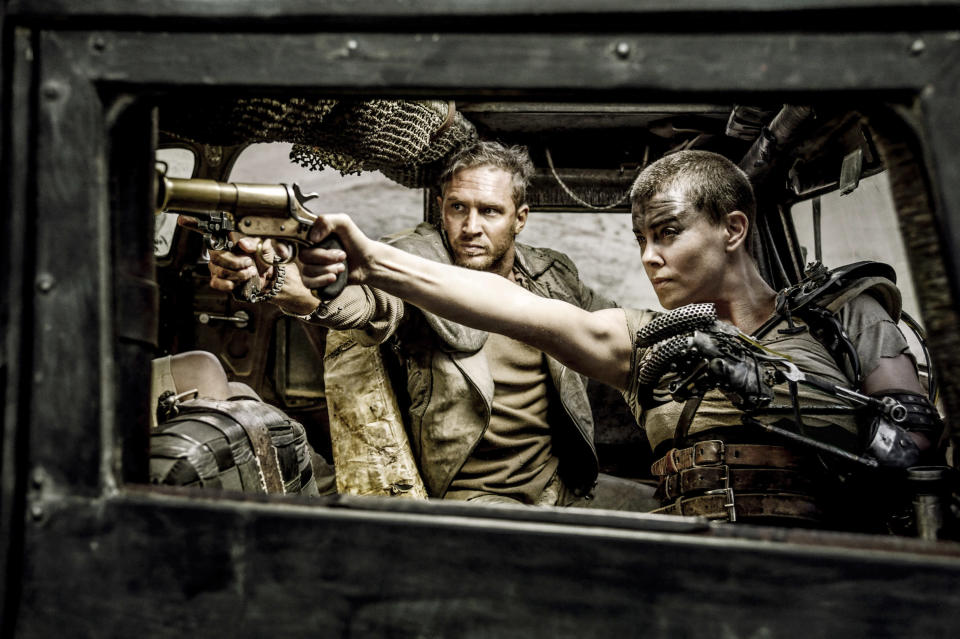 Still of Tom (L) and Charlize (R) as Max and Furiosa in the movie