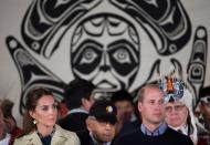 Prince William, the Duke of Cambridge, and Kate, the Duchess of Cambridge, listen during a welcoming ceremony at the Heiltsuk First Nation in the remote community of Bella Bella, B.C., on Monday September 26, 2016. THE CANADIAN PRESS/Darryl Dyck