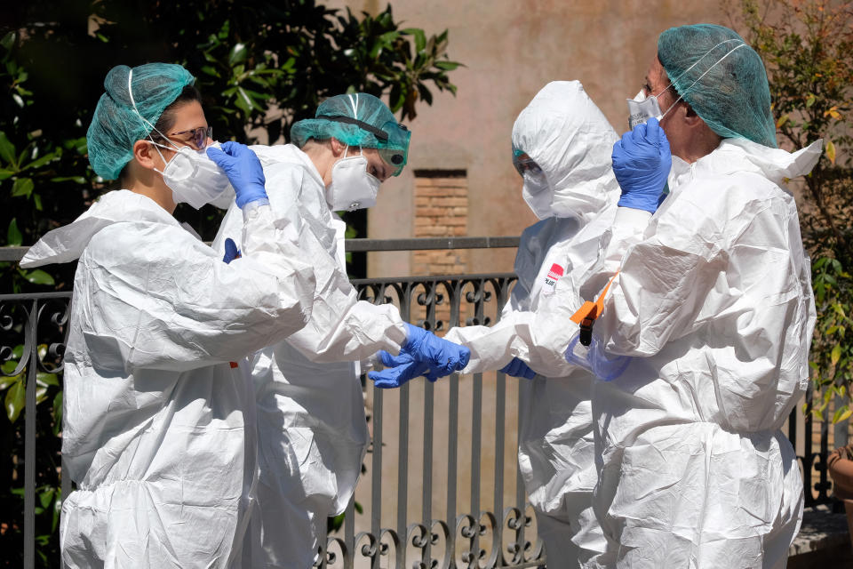 Volunteers prepare to carry out serological tests for COVID-19 at the Santa Maria del Prato nursing home in Campagnano Romano, near Rome, Thursday, April 16, 2020. The World Health Organization’s adviser to the Italian government, Dr. Ranieri Guerra, has said the “massacre” at Italian nursing homes following the coronavirus pandemic must become an opportunity for the government to reassess its health care system overall and care of its elderly. (Mauro Scrobogna/LaPresse via AP)