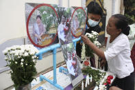People prepare for a memorial service as a tribute to a teacher who died in a protest on Feb 28, in Yangon, Myanmar, Monday, March 1, 2021. (AP Photo)