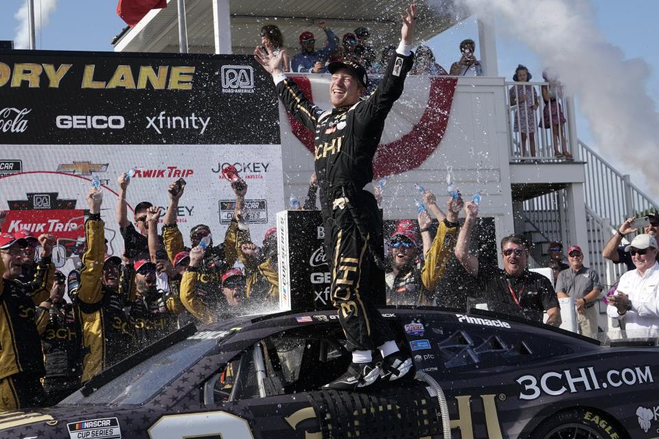 Tyler Reddick reacts after winning the Kwik Trip 250 after a NASCAR Cup Series auto race Sunday, July 3, 2022, at Road America in Elkhart Lake, Wis. (AP Photo/Morry Gash)