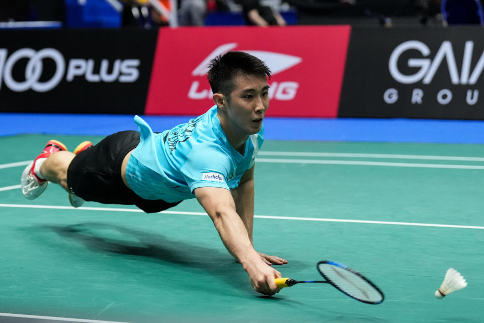Singapore shuttler Loh Kean Yew in action against Hong Kong's Lee Cheuk Yiu at the 2023 Singapore Open. 
