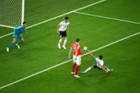 Soccer Football - World Cup - Group A - Russia vs Egypt - Saint Petersburg Stadium, Saint Petersburg, Russia - June 19, 2018 Egypt's Ahmed Fathy scores an own goal and the first for Russia REUTERS/Michael Dalder