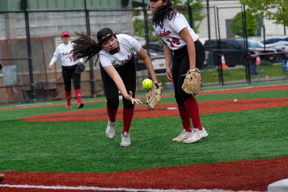 Brooke McHale, of Weehawken, tosses the ball to first base after fielding a ball from a Lyndhurst batter. Tuesday, May 2, 2023 