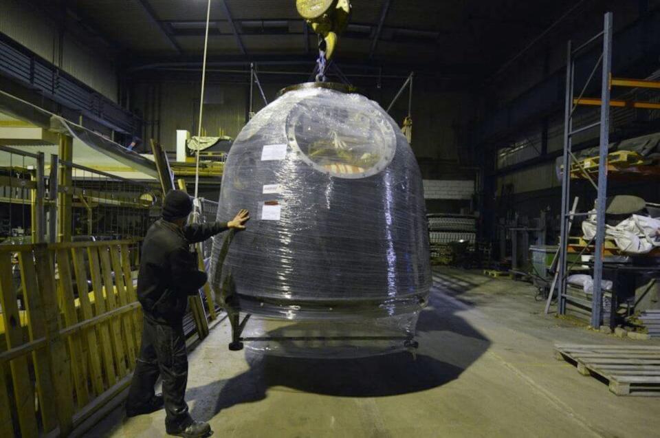 The Soyuz TMA-18M capsule, shrink wrapped for transport, arrives at the Danmarks Tekniske Museum in Denmark. <cite>Danmarks Tekniske Museum</cite>