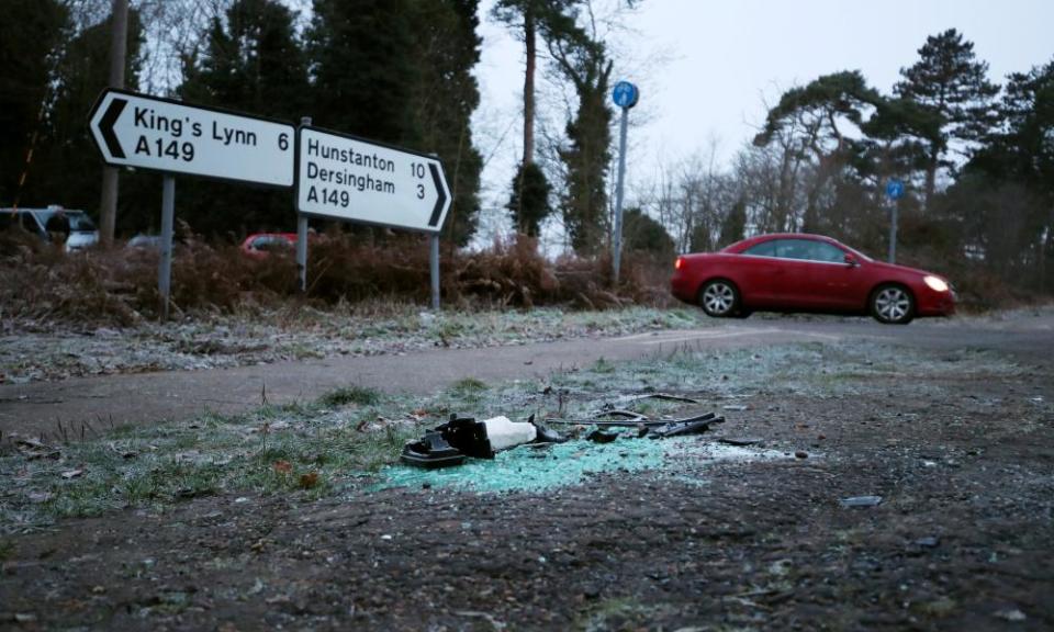 Debris and broken glass at the scene of the accident