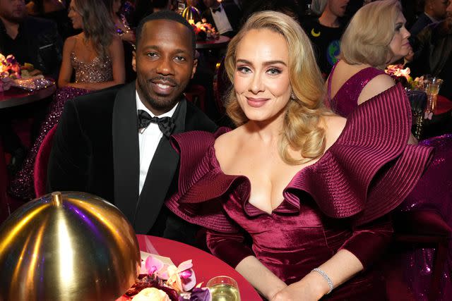 <p>Kevin Mazur/Getty</p> Rich Paul and Adele