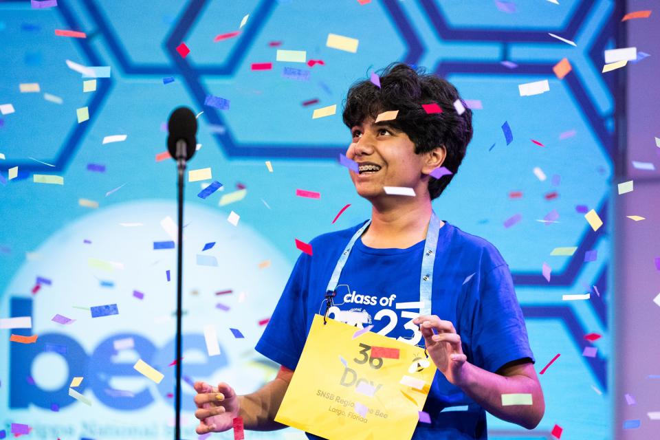 Dev Shah, 14, from Largo, Florida, celebrates after winning the 2023 Scripps National Spelling Bee.
