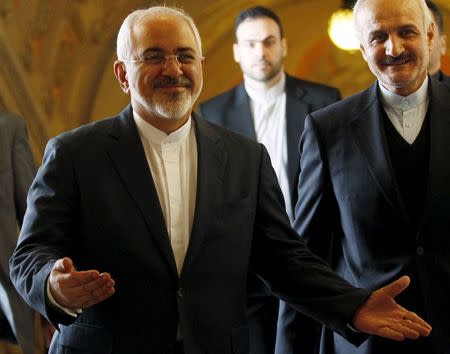 Iran's Mohammad Javad Zarif (L) arrives at the Foreign Ministry in Lisbon April 15, 2015. REUTERS/Hugo Correia - RTR4XEXO