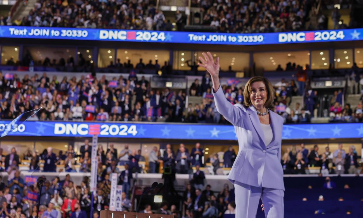 <span>Nancy Pelosi waves to the audience during the third night of the Democratic national convention in Chicago, Illinois, on Wednesday.</span><span>Photograph: Caroline Brehman/EPA</span>