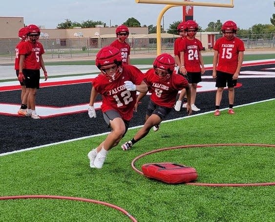 The Loving High School Falcons football team practices on the new surface at the George Frederick Field. The Falcons start the season Aug. 17, 2023 against the Carlsbad High School junior varsity.