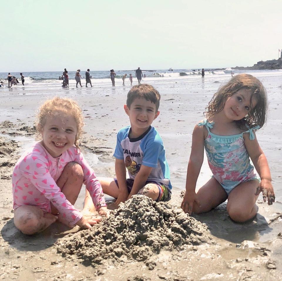 Children play in the sand at one of the beaches during a recent summer in Kennebunk, Maine. The coastal community is ready for such Beach Days to return, now that the summer of 2024 is just about here.