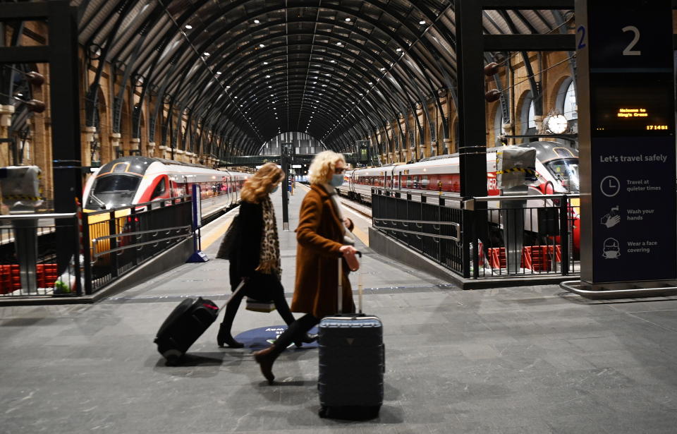 Commuters at Kings Cross train station in London, Britain.