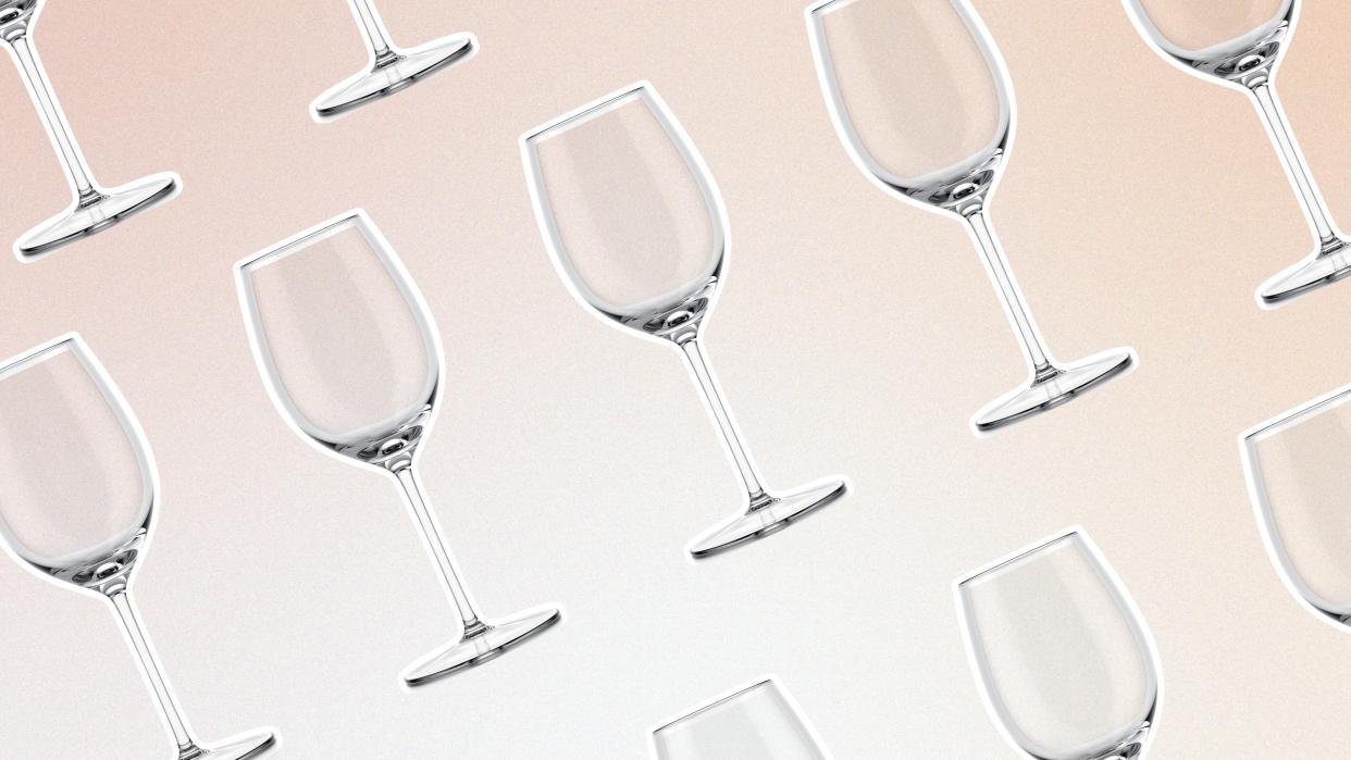  Wine glasses repeated on light pink background. 