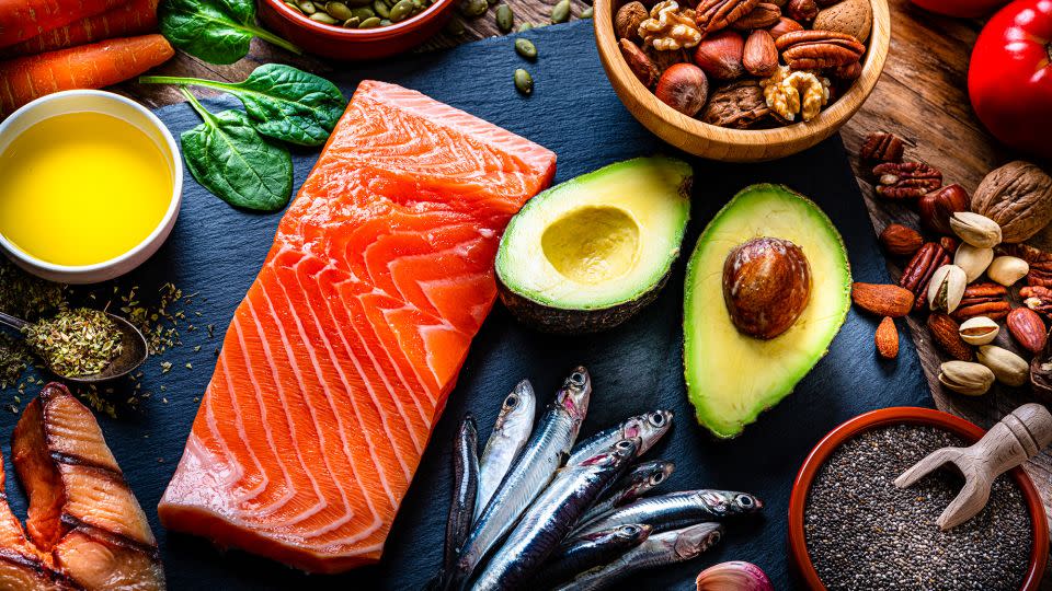 Foods rich in omega-3 fatty acids include salmon, sardines and various nuts including walnuts. - fcafotodigital/E+/Getty Images