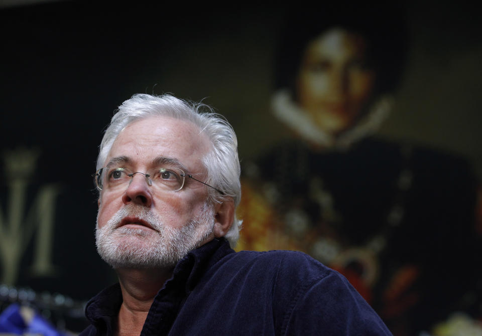 In this image taken on Thursday, June 21, 2012, Michael Jackson’s longtime costume and clothing designer, Michael Bush, listens to a question during an interview with Associated Press in Los Angeles. Bush tells the King of Pop’s style secrets in a new photo-filled book, "The King of Style: Dressing Michael Jackson" to be released on October 30, 2012. (AP Photo/Jae C. Hong)