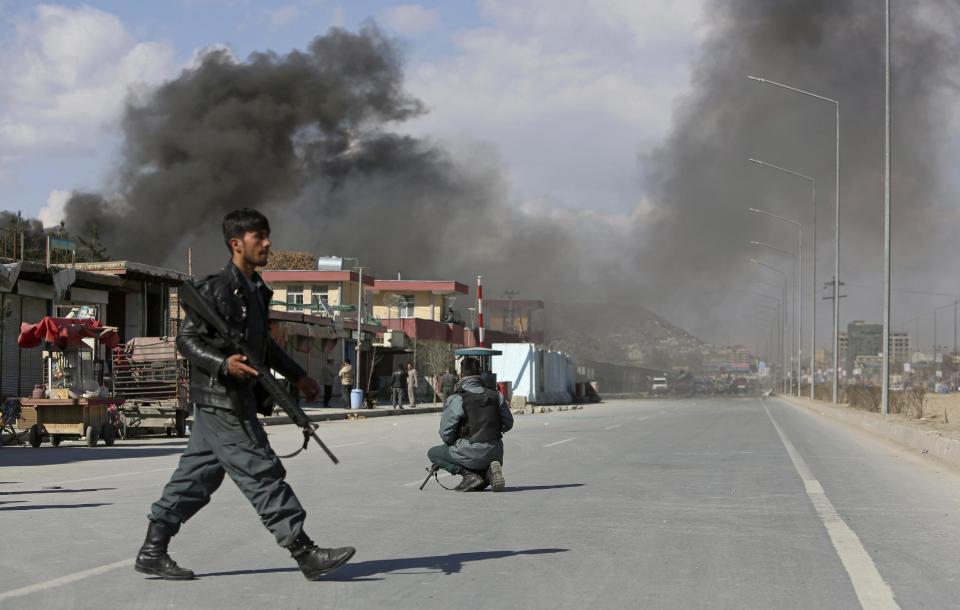 Afghan security forces respond to a suicide attack in Kabul, Afghanistan, Wednesday, March 1, 2017. Near-simultaneous attacks by Taliban suicide bombers have struck the Afghan capital, killing several people and wounding at least 50. (AP Photo/Rahmat Gul)