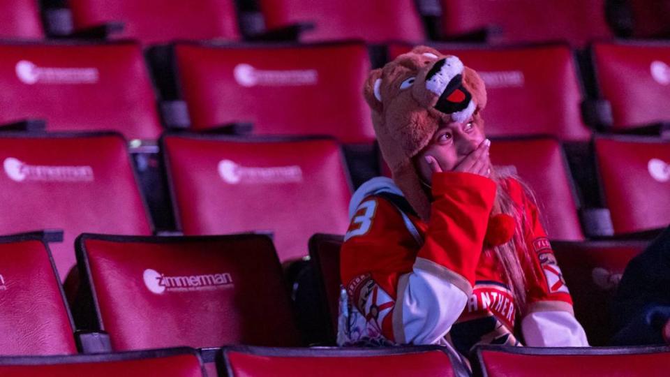 A Florida Panthers fan reacts during a watch party at the Amerant Bank Arena after her team lost to the Edmonton Oilers in Game 6 of the NHL Stanley Cup Final on Friday, June 21, 2024, in Sunrise, Fla.