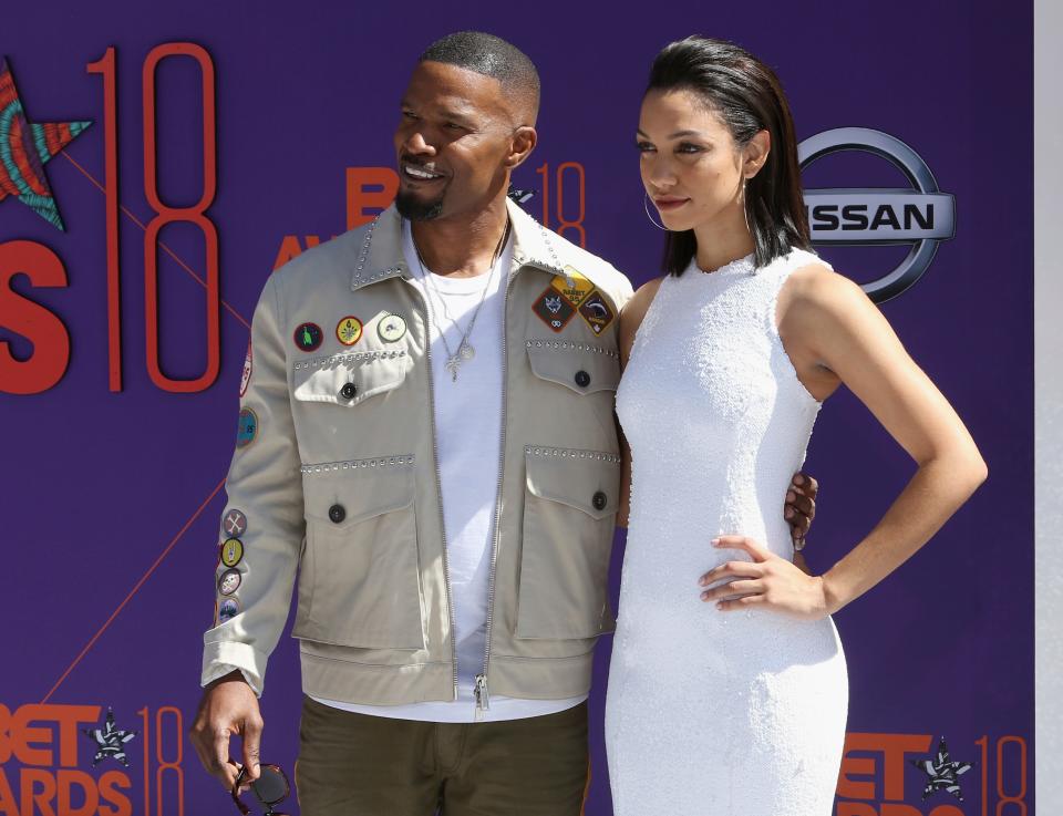 Jamie Foxx, left, and his daughter Corinne Foxx arrive at the BET Awards at the Microsoft Theater on Sunday, June 24, 2018, in Los Angeles.