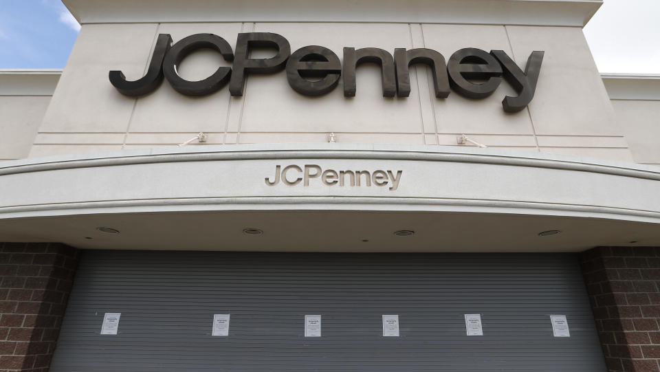 FILE - In this May 8, 2020, file photo, a J.C. Penney store sits closed in Roseville, Mich. The coronavirus pandemic has pushed troubled department store chain J.C. Penney into Chapter 11 bankruptcy. It is the fourth major retailer to meet that fate. Penney said late Friday, May 15, 2020, it will be closing some stores and will be disclosing details and timing in the next few weeks. (AP Photo/Paul Sancya, File)