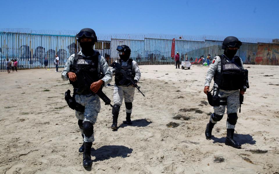 Members of the National Guard patrol the beaches of Tijuana - Reuters