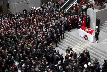 People attend the funeral ceremony of prosecutor Mehmet Selim Kiraz at the Justice Palace in Istanbul April 1, 2015.REUTERS/Osman Orsal