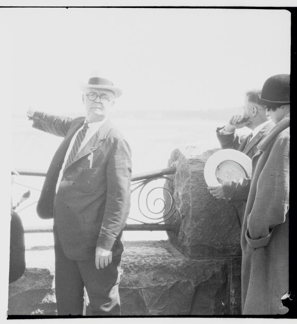 Bobby Leach pointing to the spot where he went over the falls in 1925.