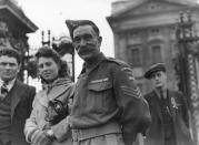 <p>A Home Guard soldier waits outside Buckingham Palace for a medals presentation.</p>