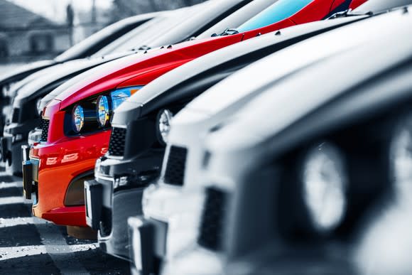 Row of passenger cars at a dealership