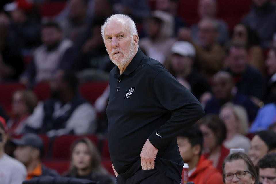 San Antonio Spurs head coach Gregg Popovich watches action from the bench against the Houston Rockets during the first half of an NBA basketball game, Monday, Dec. 11, 2023, in Houston. (AP Photo/Michael Wyke)