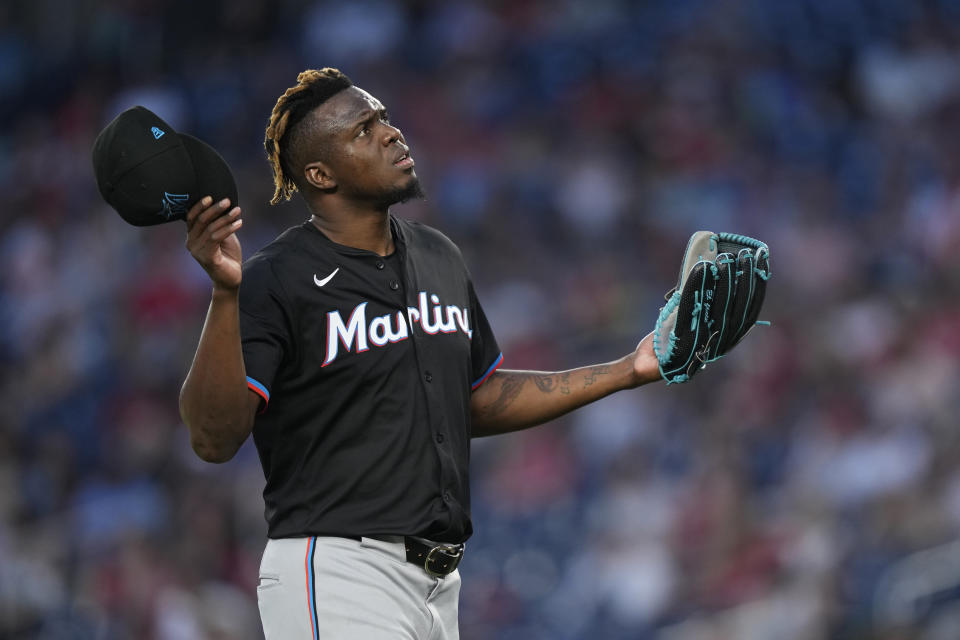 Miami Marlins relief pitcher Huascar Brazoban reacts after being taken out during the sixth inning of a baseball game against the Washington Nationals at Nationals Park in Washington, Friday, June 14, 2024. (AP Photo/Susan Walsh)