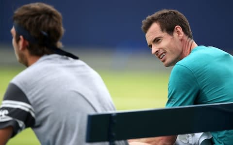 Andy Murray (right) and Cameron Norrie during a training session at the Queen's Club, London - Credit: John Walton/PA