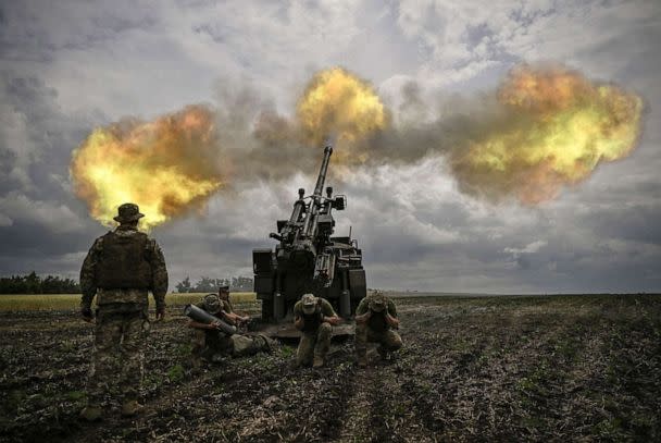 PHOTO: Ukrainian servicemen fire with a French self-propelled 155 mm/52-calibre gun Caesar towards Russian positions at a front line in the eastern Ukrainian region of Donbas, Ukraine, June 15, 2022.  (Aris Messinis/AFP via Getty Images, FILE)