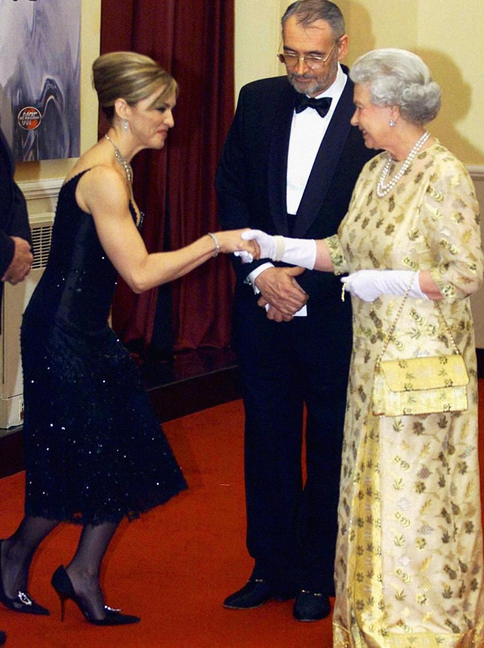 Queen Elizabeth II meets pop star and actress Madonna