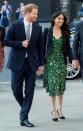 <p>Following Kate Middleton's lead, Meghan did her first outfit repeat, pairing her Alexander McQueen suit jacket from February with a stunning green floral Self Portrait dress.</p>