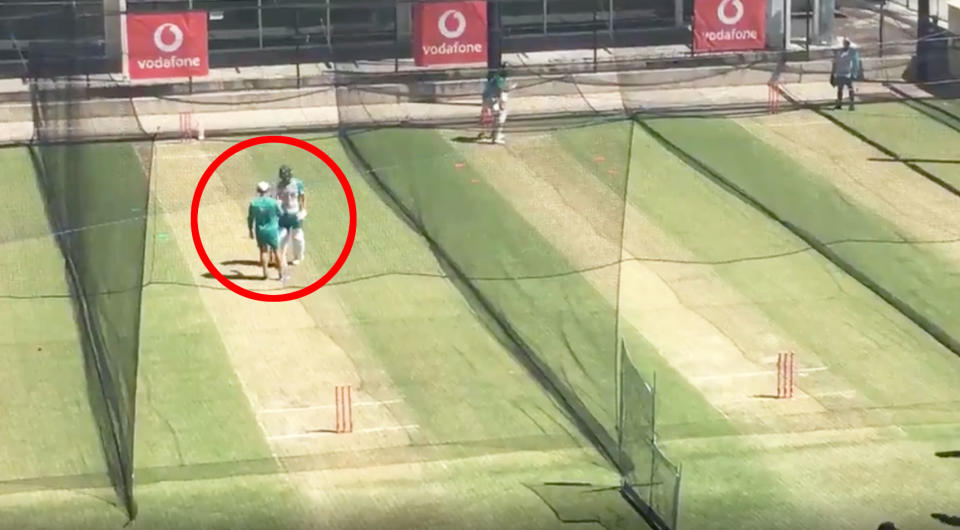 Seen here, Justin Langer confronts Joe Burns during an Australian net session.