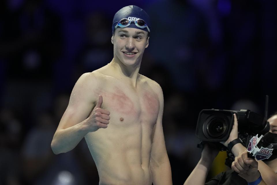 Jake Mitchell reacts after his lone men's 400 freestyle qualifying heat during wave 2 of the U.S. Olympic Swim Trials on Tuesday, June 15, 2021, in Omaha, Neb. (AP Photo/Charlie Neibergall)