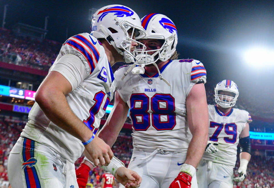 TAMPA, FLORIDA - DECEMBER 12: Dawson Knox #88 reacts after Josh Allen #17 of the Buffalo Bills score during the third quarter against the Tampa Bay Buccaneers at Raymond James Stadium on December 12, 2021 in Tampa, Florida. (Photo by Julio Aguilar/Getty Images)