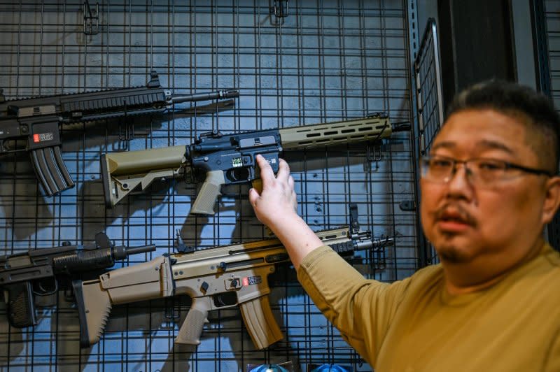Freidrich Wang, who owns an Airsoft pellet gun store and shooting range in Taipei, said Taiwanese citizens should be armed and trained to fight off a Chinese invasion. Photo by Thomas Maresca/UPI